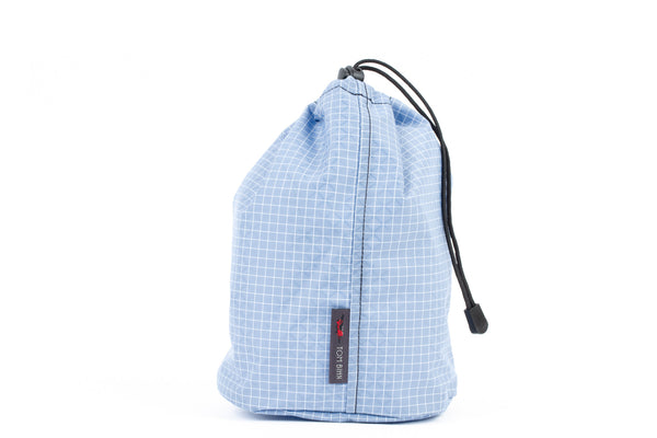 A Size 3 Tidal (light blue with white grid) 200 Halcyon Travel Stuff Sack.